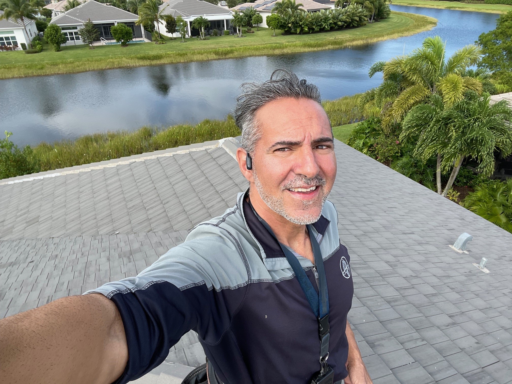 Nicholas J. Catalano inspecting a roof